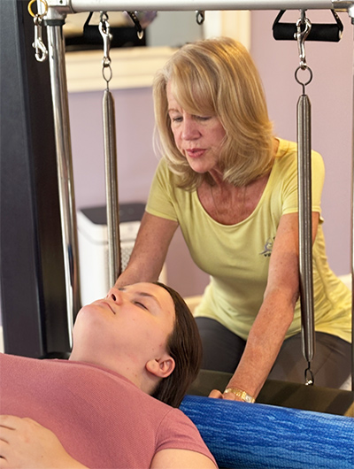 applying a foam roller to the neck